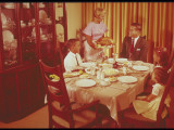 Family Sitting Down Thanksgiving Dinner Photographic Print by Lambert 