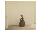 Femme assise, de profil dans une cour aux murs blancs Giclee Print by Gustave Eiffel