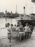 Young Girls of the Sophie Germain High School in Paris Getting their Canoe Out of the Water Photographic Print