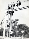 Physical Education: Crossing the Crossbar and And Going Down the Bar Photographic Print