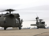 Two UH-60 Black Hawks Taxi Out for a Mission over Northern Iraq Photographic Print