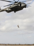 An Air Force Pararescueman Conducts a Combat Insertion and Extraction Exercise in Djibouti, Africa Photographic Print