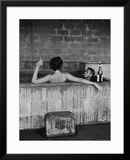 Actor Steve McQueen and Wife Taking Sulfur Bath at Home Framed Photographic Print by John Dominis