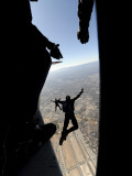 US Air Force Academy Parachute Team Jumps Out of an Aircraft over Nellis Air Force Base, Nevada Photographic Print