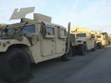 Humvees Sit on the Pier at Morehead City, North Carolina, Awaiting Deployment Photographic Print