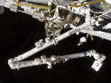 The Canadian-Built Space Station Remote Manipulator System (Canadarm2), During Undocking Activities Lámina fotográfica The Canadian-Built Space Station Remote Manipulator System (Canadarm2), During Undocking Activities Lámina fotográfica