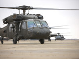 UH-60 Black Hawks Taxis Out for a Mission over Northern Iraq Photographic Print
