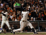 Texas Rangers v San Francisco Giants, Game 2: Juan Uribe Photographic Print by Justin Sullivan
