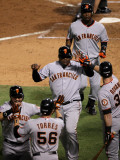 Texas Rangers v. San Francisco Giants, Game 5:  Cody Ross, Juan Uribe, Edgar Rentaria, Aaron Rowand Photographic Print by Stephen Dunn