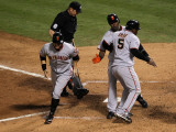 Texas Rangers v. San Francisco Giants, Game 5:  (L-R) Cody Ross, Edgar Renteria and Juan Uribe Photographic Print by Stephen Dunn
