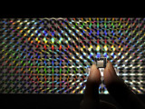 A Storage Device the Size of a Stamp Can Hold Information from 12 Cds Photographie par Mark Thiessen