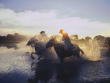 Argentine Gauchos Race across a Lake Near Beron De Astrada Photographie par O. Louis Mazzatenta