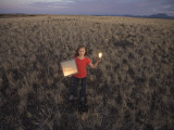 A Young Girl Experiments with Solar Energy Photographie par John Burcham