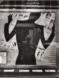 Photographer's Reflection in a Cut-Out Silhouette in a Window Photographie par Maynard Owen Williams