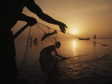 Fishermen Pull Up their Nets at Sunrise Photographic Print by Gordon Gahan