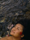 A Cherokee Teacher Immerses Herself in the Oconaluftee River Photographic Print by Maggie Steber
