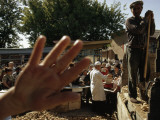 Self-Appointed Censor Blocks Photograph of Potatoes Being Sold Photographic Print by Dean Conger