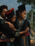 Hmong Girls Cling to Each Other During Social Unrest Photographic Print by W.E. Garrett