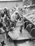 Moslem Women Attend a Ceremonial Bathing Spot Photographic Print by Maynard Owen Williams