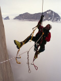 A Man Uses an Ascender on the Upper Half of Great Sail Peak Photographie par Gordon Wiltsie