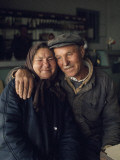 Smiles Crease the Faces of a Romanian Couple Photographie par Winfield Parks