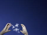 A Girl Tries to Capture a Cloud in Her Hands Photographie par John Burcham