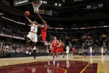 Philadelphia 76ers v Cleveland Cavaliers: Ramon Sessions and Jrue Holiday Photographic Print by David Liam Kyle