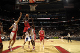 Philadelphia 76ers v Toronto Raptors: Jrue Holiday and Peja Stojakovic Fotografisk tryk af Ron Turenne