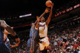 Charlotte Bobcats v Miami Heat: Chris Bosh Photographic Print by Andrew Bernstein
