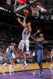 Washington Wizards v Sacramento Kings: Omri Casspi and Gilbert Arenas Photographic Print by Rocky Widner