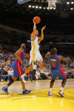Detroit Pistons v Golden State Warriors: Stephen Curry and  Rodney Stuckey Photographic Print by Rocky Widner