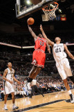 Chicago Bulls v San Antonio Spurs: Ronnie Brewer and Tim Duncan Photographic Print by D. Clarke Evans
