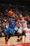 Orlando Magic v Chicago Bulls: Jameer Nelson and Derrick Rose Photographic Print by Gary Dineen