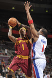 Cleveland Cavaliers v Detroit Pistons: Daniel Gibson and Tracy McGrady Photographic Print by Allen Einstein