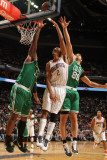 Boston Celtics v Charlotte Bobcats: Glen Davis and Shaun Livingston Photographic Print by Kent Smith