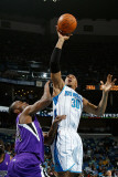 Sacramento Kings v New Orleans Hornets: David West and Carl Landry Photographic Print by Chris Graythen