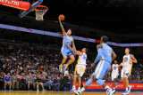 Denver Nuggets v Golden State Warriors: Chris Anderson and Stephen Curry Photographic Print by Rocky Widner