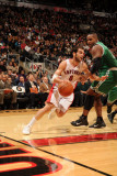 Boston Celtics v Toronto Raptors: Jose Calderon and Glen Davis Photographic Print by Ron Turenne