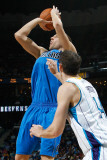 Dallas Mavericks v New Orleans Hornets: Dirk Nowitzki and Jason Smith Photographic Print by Chris Graythen