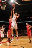 Houston Rockets v Toronto Raptors: Andrea Bargnani and Brad Miller Photographic Print by Ron Turenne