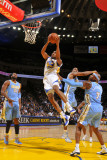 Denver Nuggets v Golden State Warriors: Reggie Williams Photographic Print by Rocky Widner