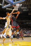 Miami Heat v Golden State Warriors: Chris Bosh and Andris Biedrins Photographic Print by Rocky Widner