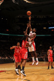 Houston Rockets v Toronto Raptors: Amir Johnson and Jordan Hill Photographic Print by Ron Turenne