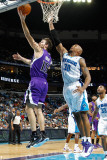 Sacramento Kings v New Orleans Hornets: Beno Udrih and David West Photographic Print by Chris Graythen