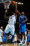 Dallas Mavericks v New Orleans Hornets: Brendan Haywood and Emeka Okafor Photographic Print by Chris Graythen