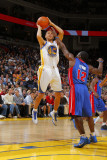 Detroit Pistons v Golden State Warriors: Stephen Curry and  Will Bynum Photographic Print by Rocky Widner