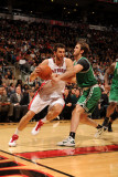 Boston Celtics v Toronto Raptors: Andrea Bargnani and Semih Erden Photographic Print by Ron Turenne