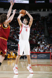 Cleveland Cavaliers v Houston Rockets: Luis Scola and Anderson Varejao Photographic Print by Bill Baptist