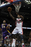 Los Angeles Lakers v Detroit Pistons: Rodney Stuckey and Kobe Bryant Photographic Print by Allen Einstein