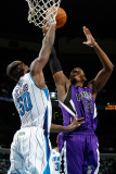 Sacramento Kings v New Orleans Hornets: Jason Thompson and Emeka Okafor Photographic Print by Chris Graythen